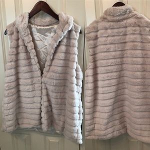 Cream faux fur vest. Never worn.